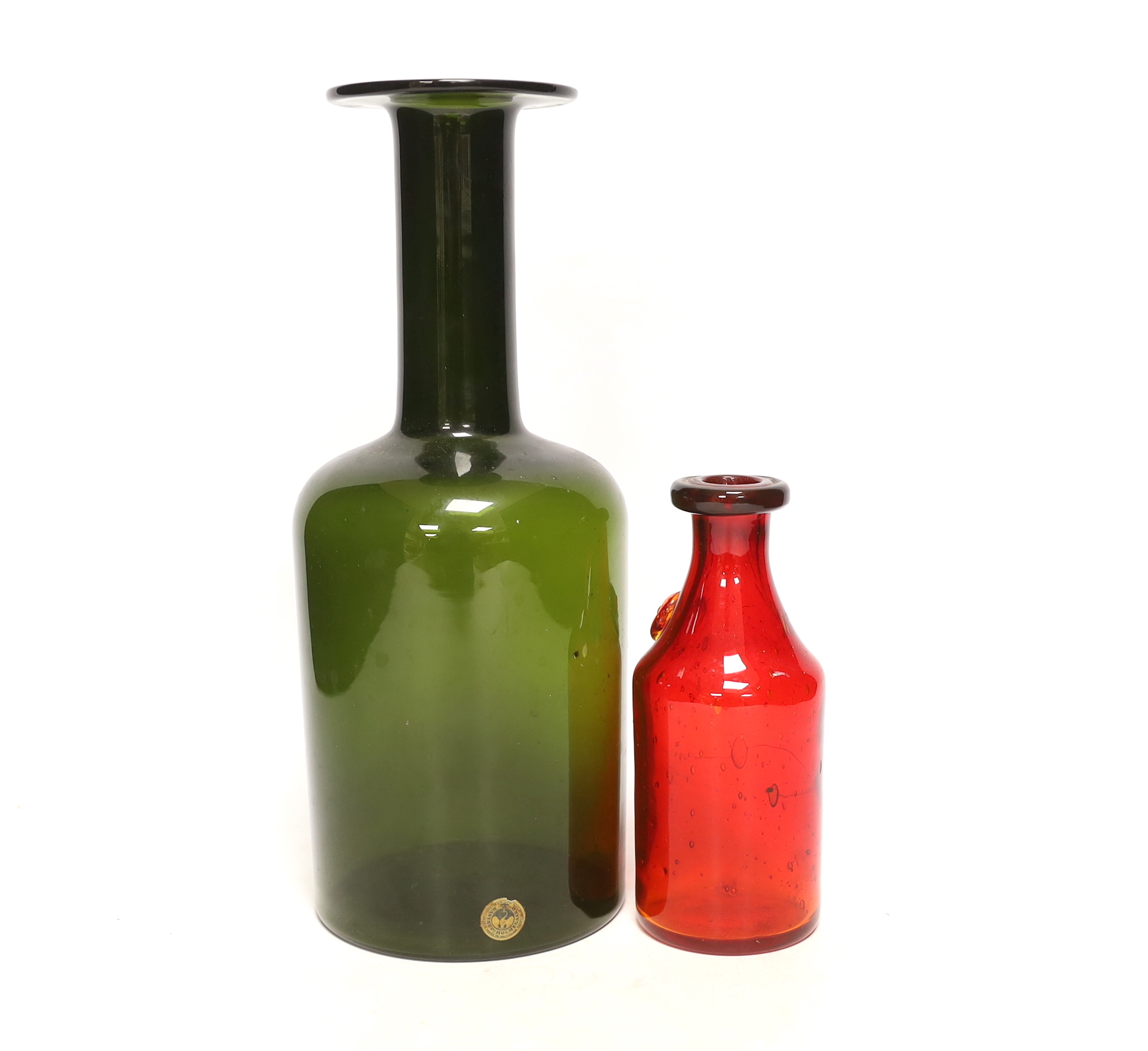 Eric Hogland, a ruby glass bottle and a Holmegaard bottle, 30cm high